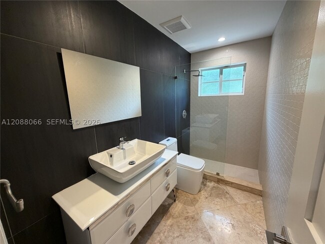 Building Photo - 9341 Dickens Ave