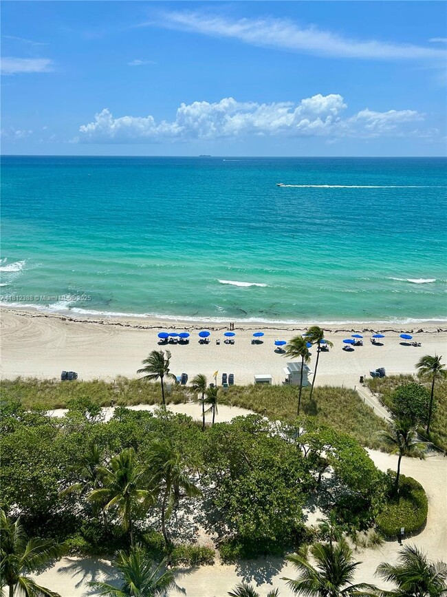 Building Photo - 10275 Collins Ave