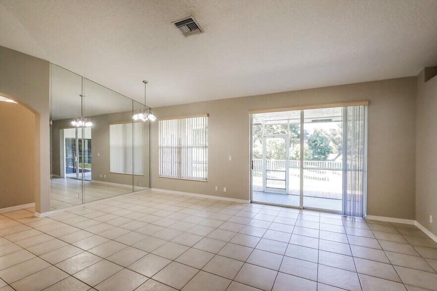 Building Photo - 103 Cocoplum Cir