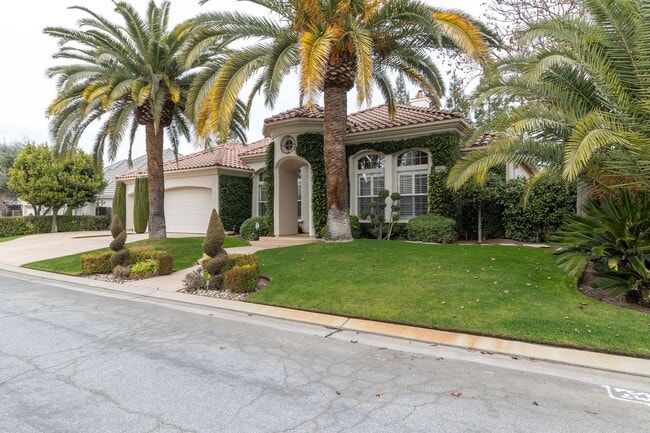 Building Photo - Luxurious Furnished Spanish-Style Home wit...