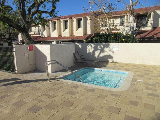 Building Photo - Duggan Property Management, Inc presents this 3BR +2.5 bath in Encino Village Townhomes