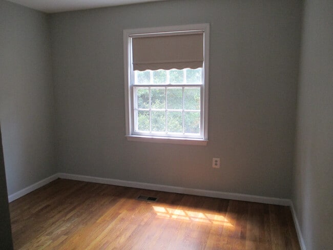 Building Photo - SPACIOUS BRICK TOWN-HOME