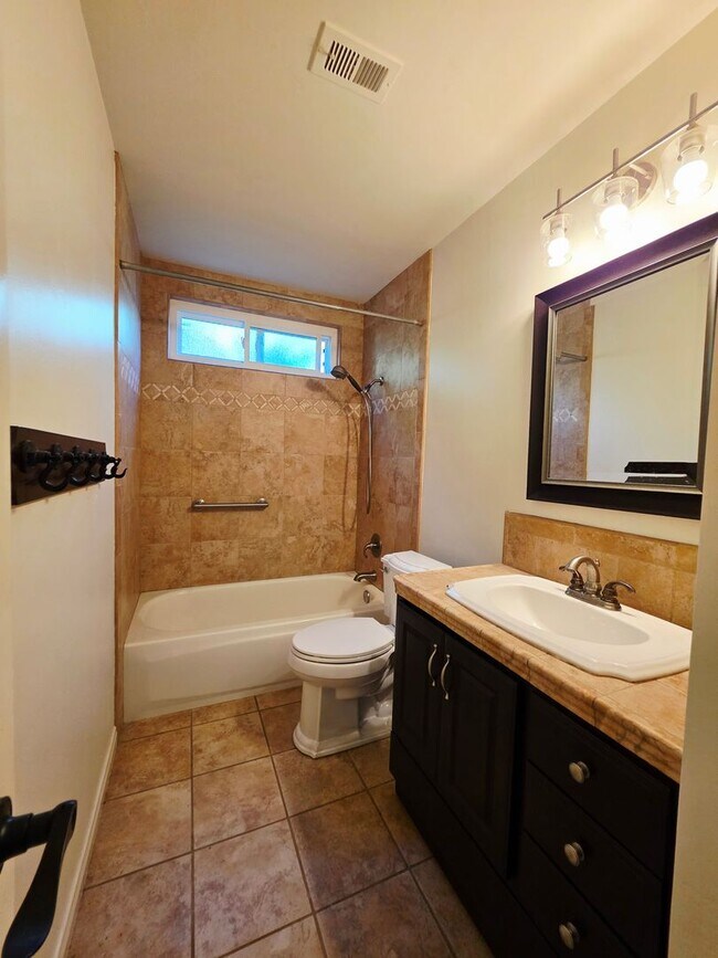 Building Photo - Spacious, Updated 4BR/2BA Oceanside Home | 3-Car Garage | Large Backyard