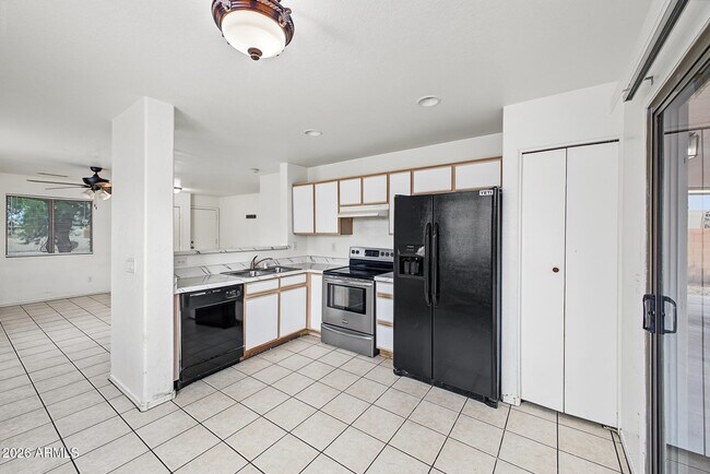 Building Photo - 3015 N 84th Dr