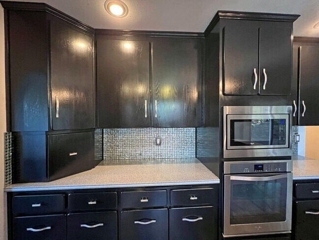 Building Photo - Stunning 4 Bedroom 2.5 Bath with Peek-a-Boo View of Puget Sound
