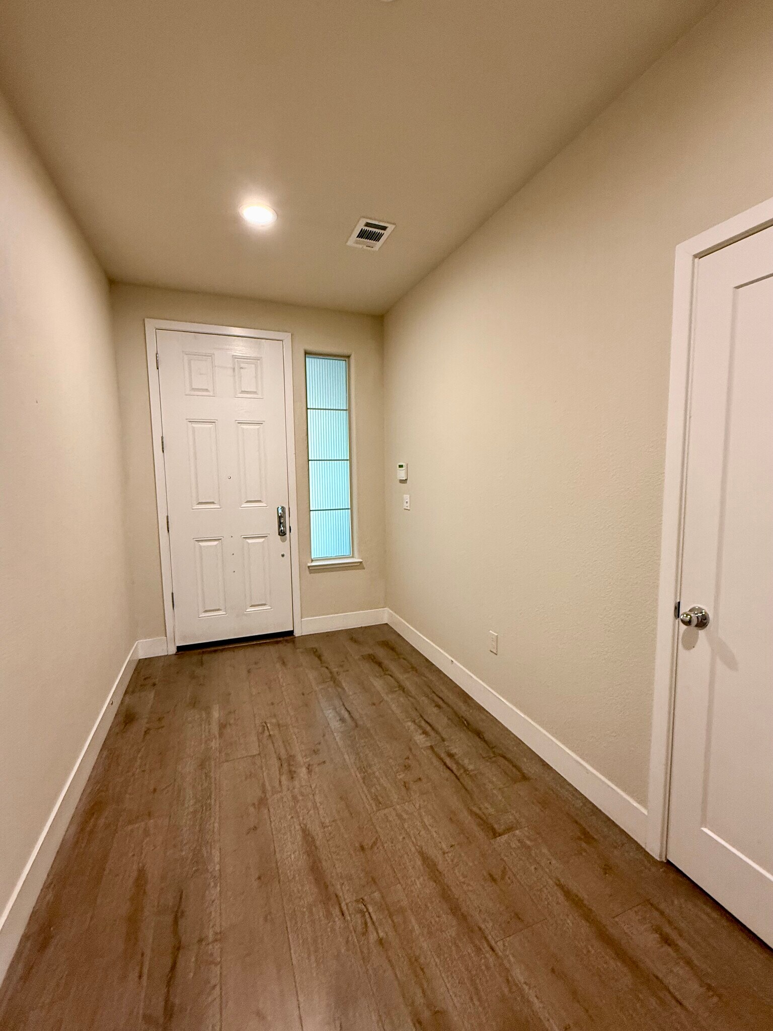Entrance…high ceiling, entry closet - 27 Rogers Ln