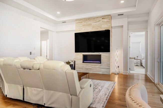 Building Photo - Resort-Style Furnished Lakefront Living in SilverLeaf | 100” Theater & Golf Cart Included