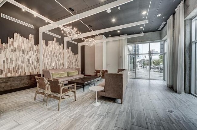 Building Photo - Stunning condo in the heart of SoBro at the Encore! Beautiful 1 bed, 1 bath on the amenity floor ...