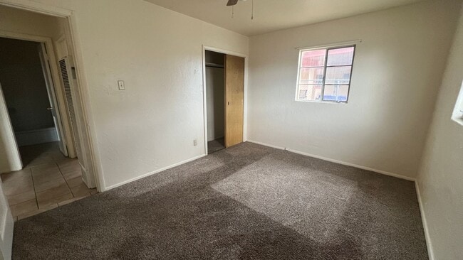 Building Photo - 3 Bedroom home with 1 Bathroom and Large Back yard