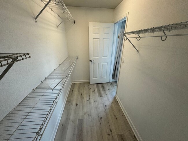 Building Photo - Lake Views. Upgraded Finishes. Gated Commu...