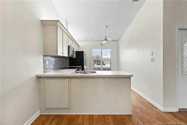 Building Photo - 7711 SE Sugar Sand Cir