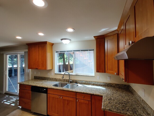 Kitchen with stainless steel appliances - 17729 NE 88th Pl