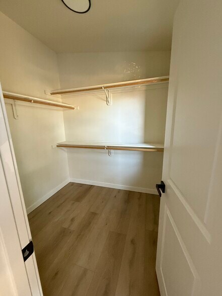 Primary walk-in closet - 1033 Northeast Kayak Loop