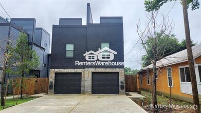 Building Photo - Modern, stylish 3 story condo with a priva...