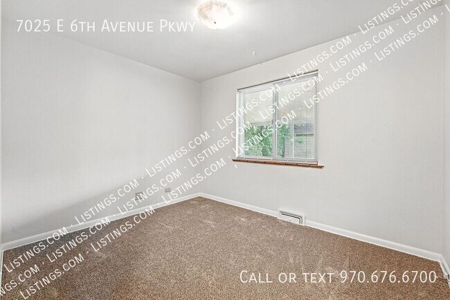Building Photo - 7025 E 6th Ave