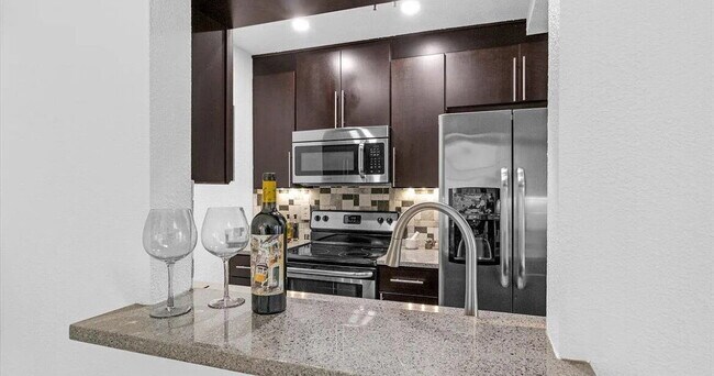 Building Photo - "Chic & Cozy 1-Bedroom Retreat with Modern...