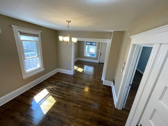 Dining room, living room, stained glass window - 3622 Humboldt Ave N