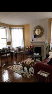 Left half of living room, right side is equal in size - 2130 Scottwood Ave