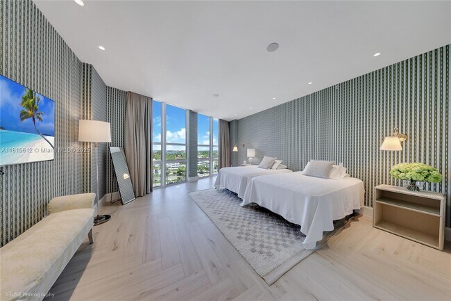 Building Photo - 10225 Collins Ave