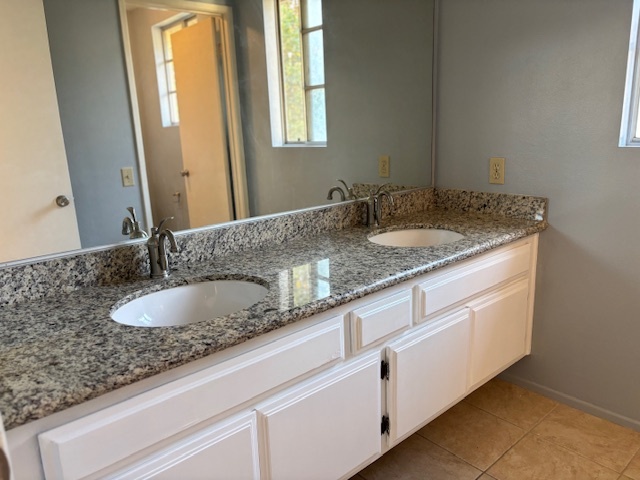 Master bathroom with double sink vanity. - 8724 Edmonton Pl