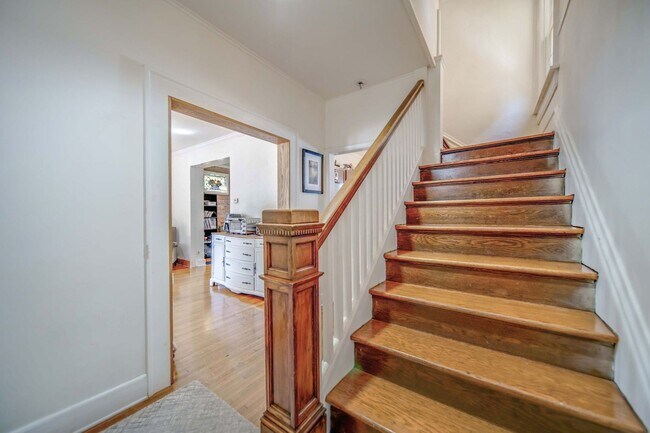 Building Photo - Charming 5-Bedroom Home with Exposed Brick and Modern Upgrades