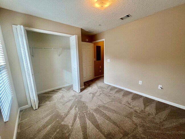 Building Photo - Gated Comfort Condo, Poolside Vibes: Your Next Home Awaits at Merrill Pines