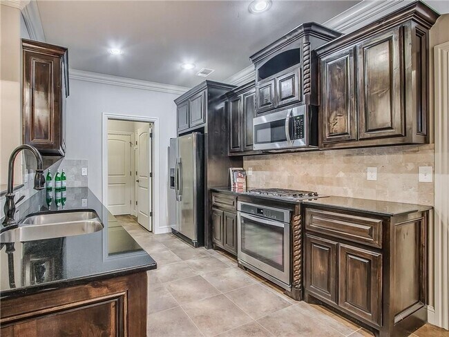 Building Photo - Lone Oak Lakes - Deer Creek Schools - 3 Bed | 2.5 Bath | 3 Car Garage | Bonus Room | Storm Shelte...
