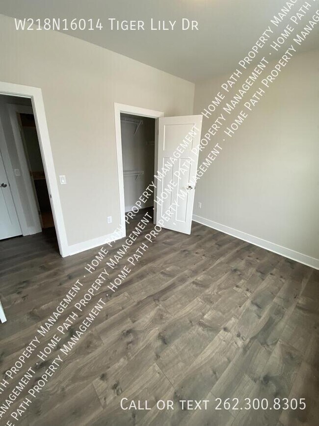 Building Photo - W218N16014 Tiger Lily Dr