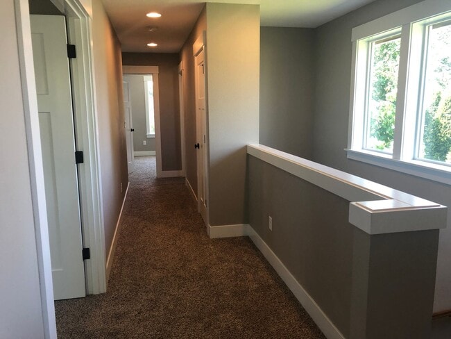 Building Photo - Beautiful New Home with Garage and Yard! A...