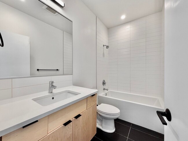 Building Photo - Modern 3-Level Townhome (2020) with Private Garage, Roof Deck & A/C