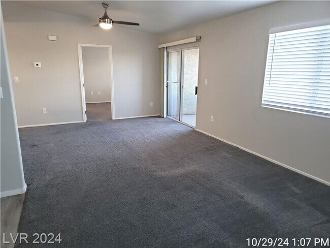 Building Photo - SECOND-FLOOR UNIT IN A GATED SOUTHWEST COM...