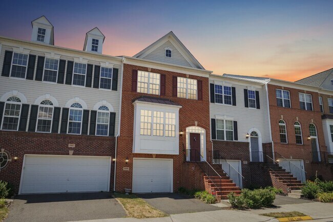 Building Photo - This beautiful townhome spans three finished levels and over 2800 square feet.