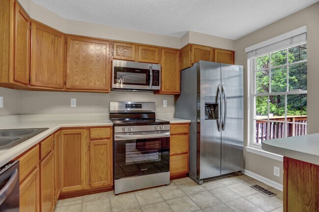 Building Photo - Charming 3-Bedroom Townhome for Rent in Ab...
