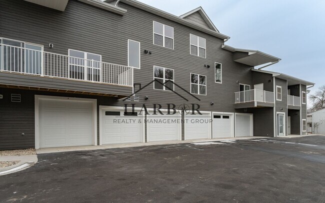Building Photo - Brand NEW Caroline Apartments 201 -  Move ...