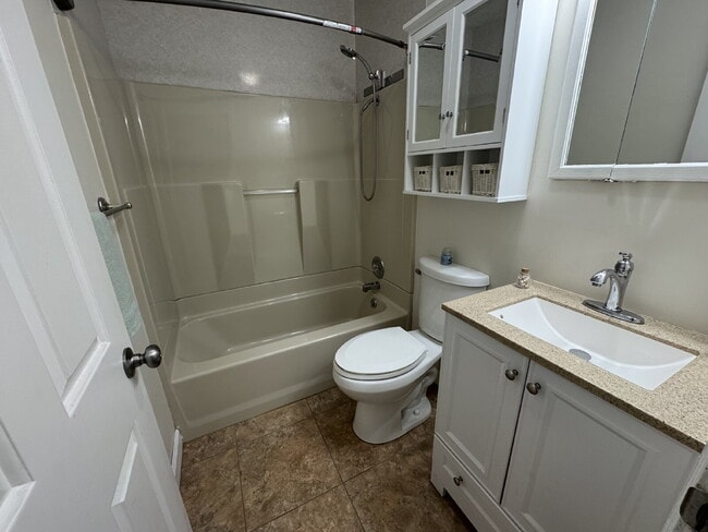 Building Photo - “Spread Out!” — 3 Bed Home with Sun Room + Multiple Living Spaces