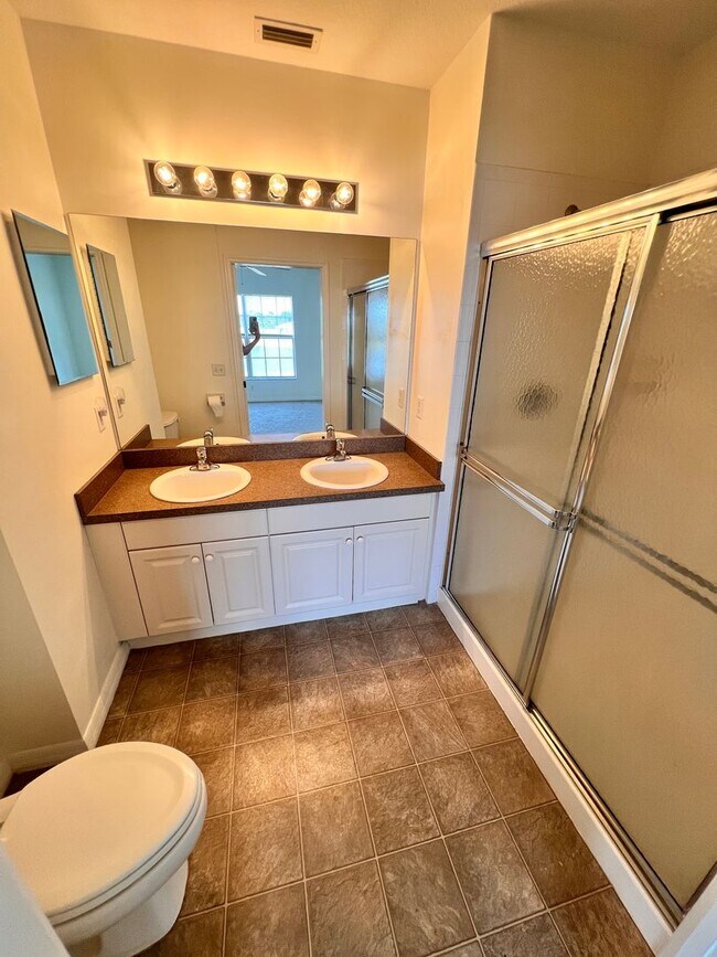 Building Photo - Annual Unfurnished Rental – 3 Bed, 2 Bath Condo in Gated Community!