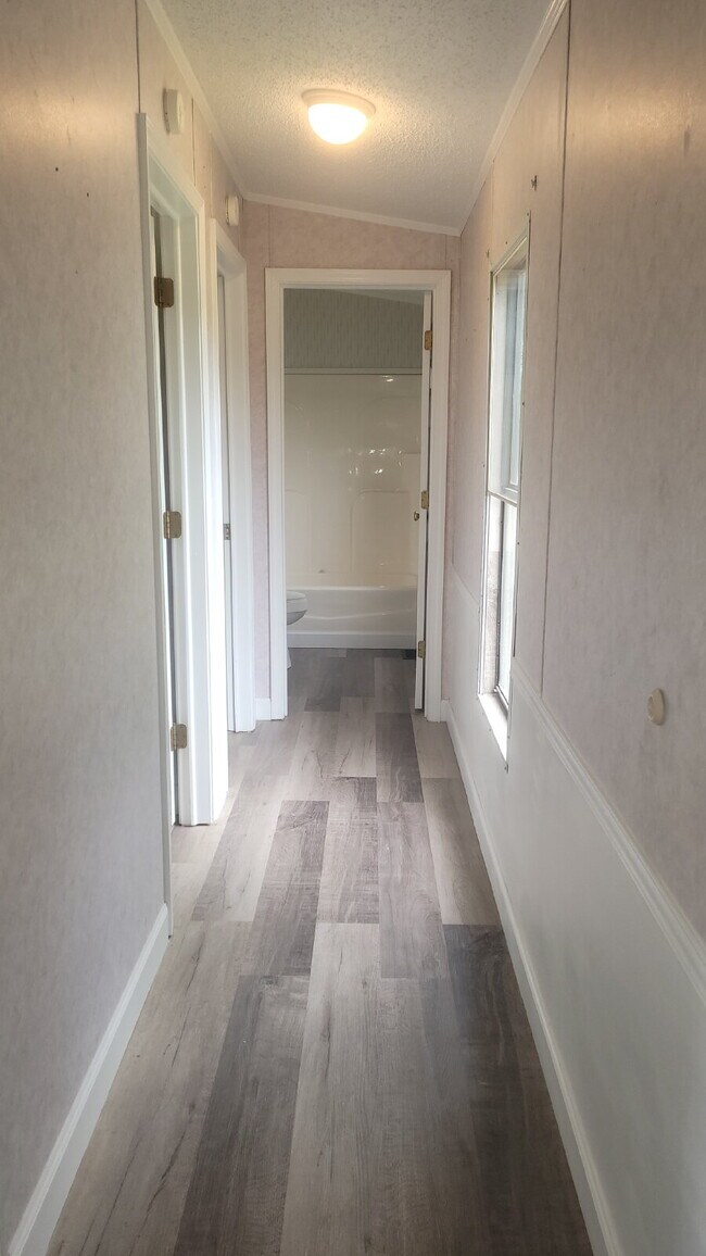 Building Photo - " 2-Bed, 2-Bath Mobile Home Retreat in Tan...