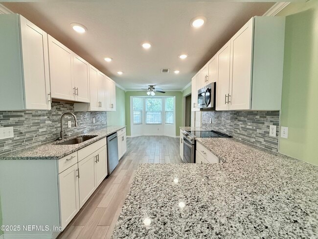 Building Photo - 10373 Windfern Ct N
