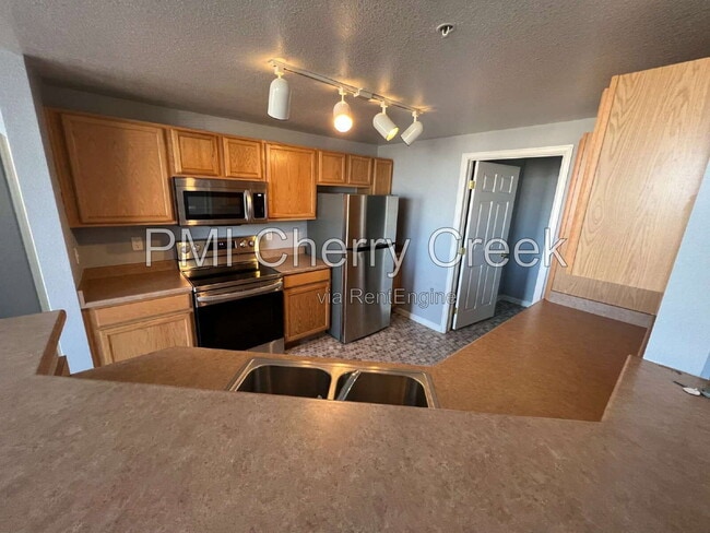 Building Photo - 5705 N Genoa Way