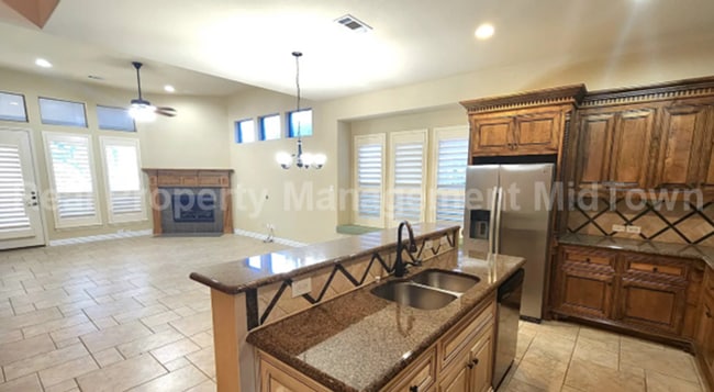 Building Photo - Well-Planned 4BR/3BA—Space for Guests, Off...