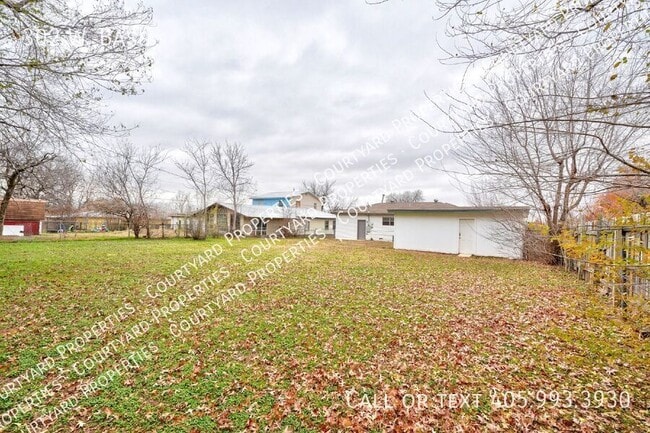 Building Photo - 302 W. Bass-