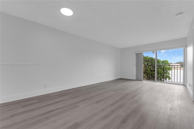 Building Photo - 8560 N Sherman Cir