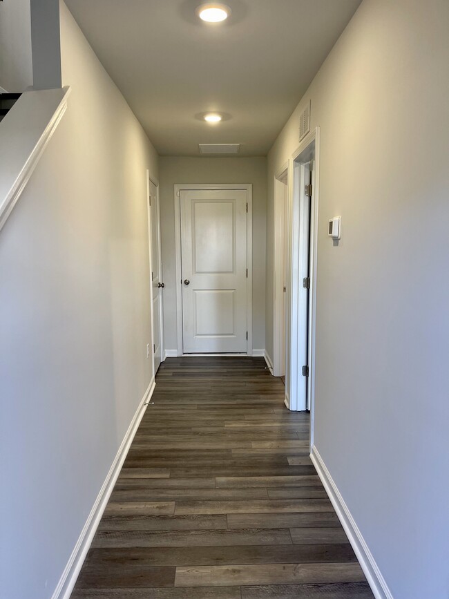 Level 1 hallway and the garage door - 3024 Castle Loch Ln