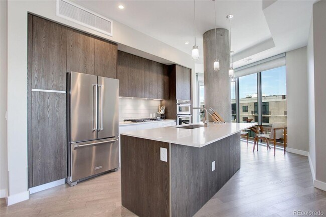 Building Photo - Stunning 2-Bedroom Condo at Sloan's Lake's Premier Lakehouse Community