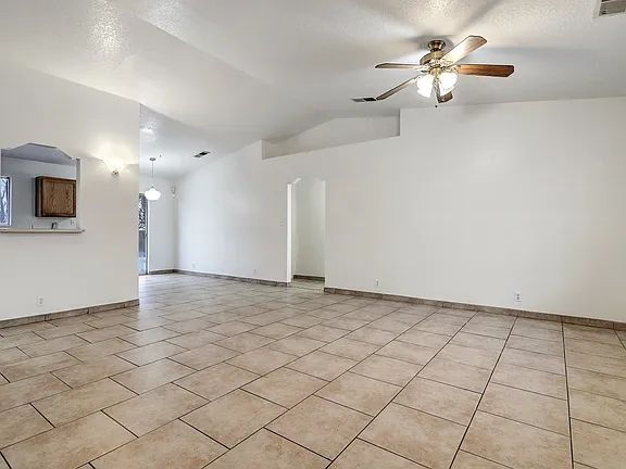 Building Photo - "Spacious 4-Bedroom Gem on Quartz Dr – Your Ideal Albuquerque Retreat!"