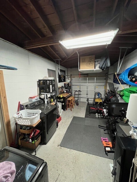 Attached garage with washer/dryer & ceiling storage rack. - 30 W Par St