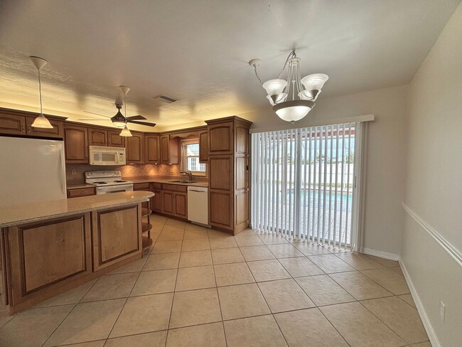 Building Photo - 3 Bed, 2 Bath Pool Home With A Fenced Yard...