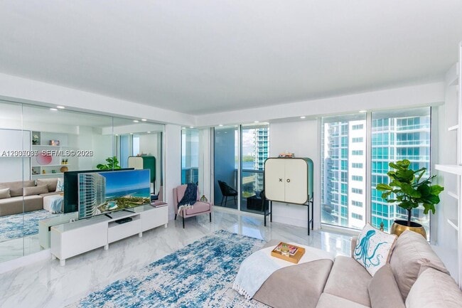 Building Photo - 10275 Collins Ave