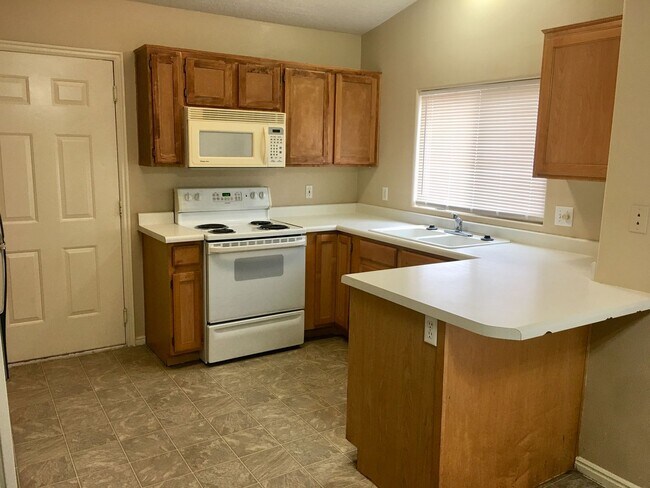 Building Photo - 1308 Millcreek Duplex