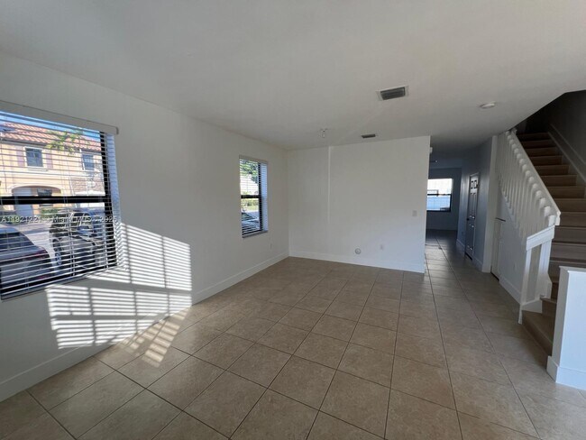 Building Photo - 9399 W 33rd Ln